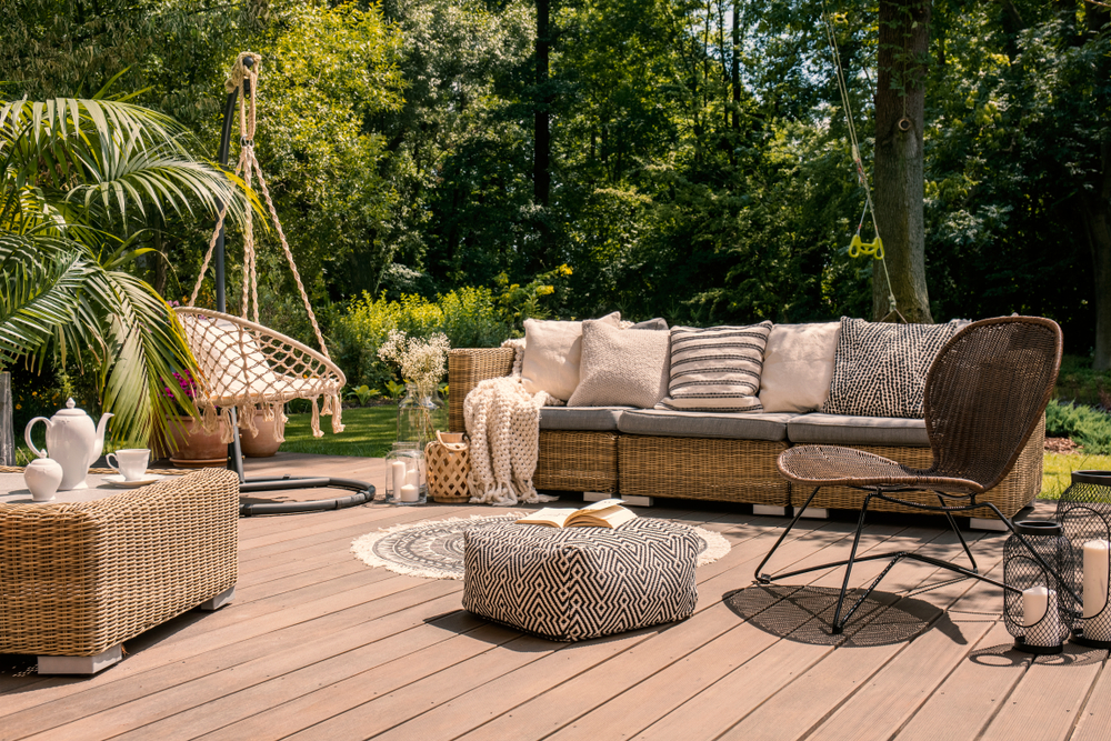 A,Rattan,Patio,Set,Including,A,Sofa,,A,Table,And